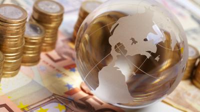 Currency and money on the table representing global investment and finance. 